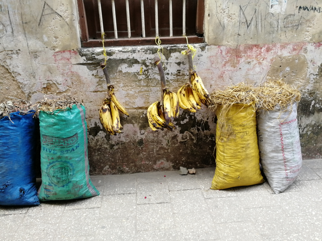 bananas in a market in stone town, zanzibar