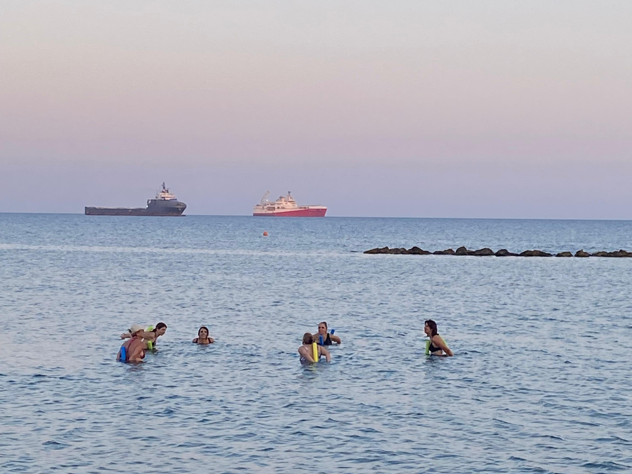 Women in water aerobics class in Mediterranean Sea